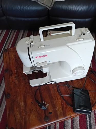 Singer sewing machine turns - singer,